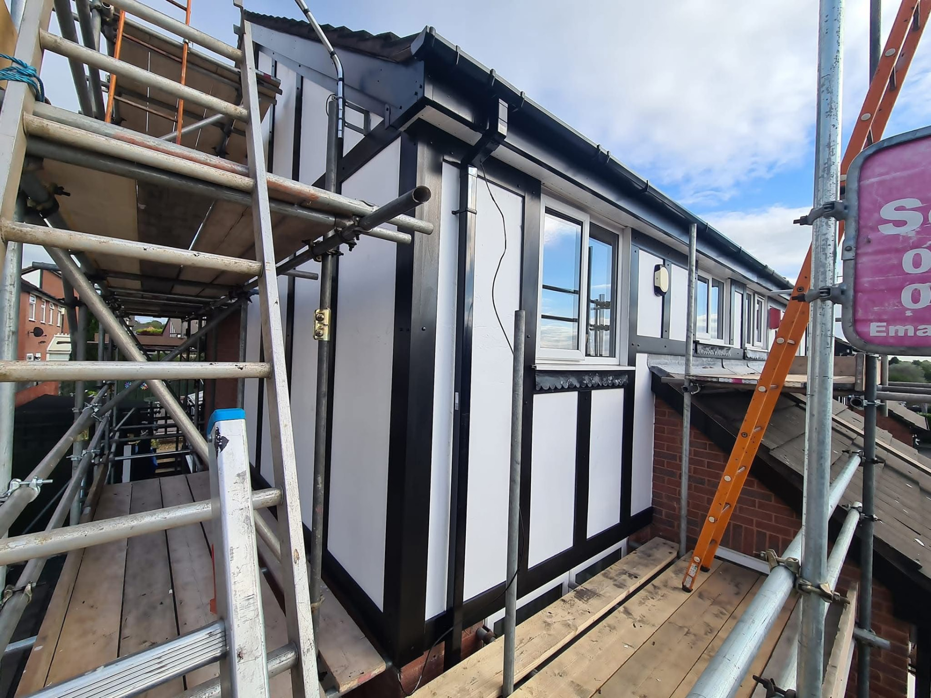 Completed black uPVC fascias, soffits and guttering on a Staffordshire property